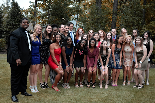 A group of juniors attend a picture party before the 2019 "Atlanta" Homecoming dance