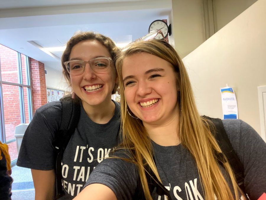 Abby Testani 21 (left) and Kathryn Taylor 21 (right) smile in their Active Minds t-shirts.