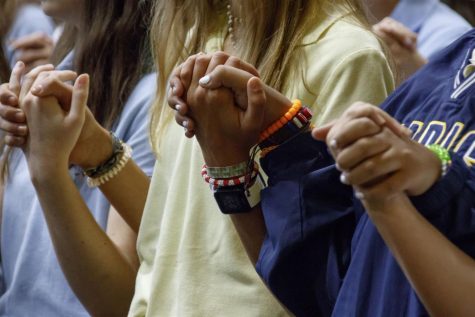 Marist students pray together at a (pre-COVID) Mass.