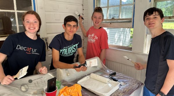 As part of the Catholic Heart Work Camp, students help renovate a home  during the summer of 2023.