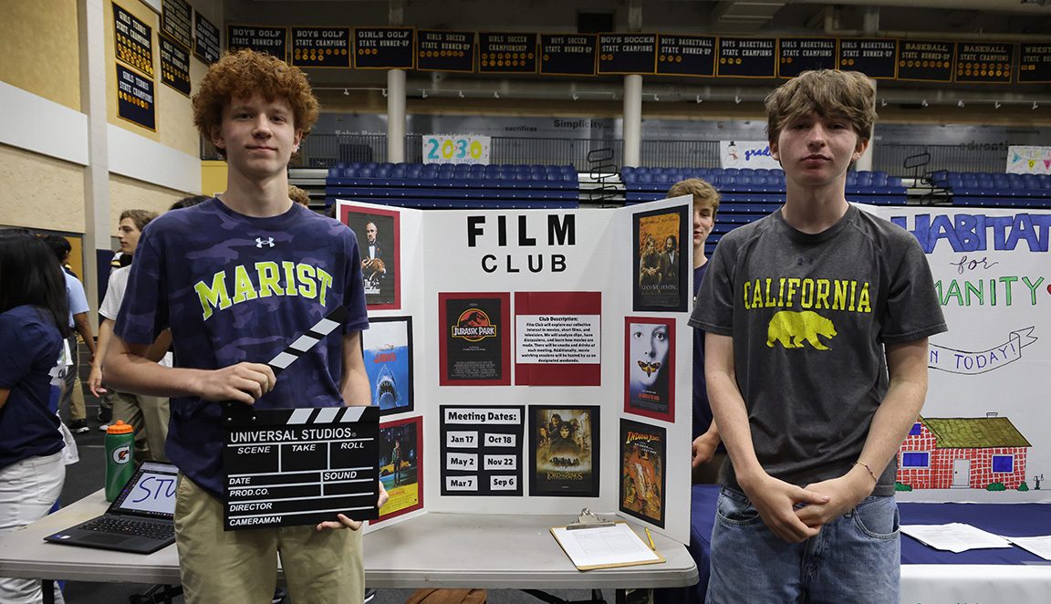 Liam Wolfe and Luke Childs stand ready during the activity fair to welcome new members into the Film Club.