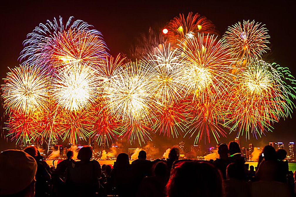 Fireworks appear in the night sky above Perth, Australia. (Photo Credit: Hannes Nitzsche | CC Share Alike 3.0)