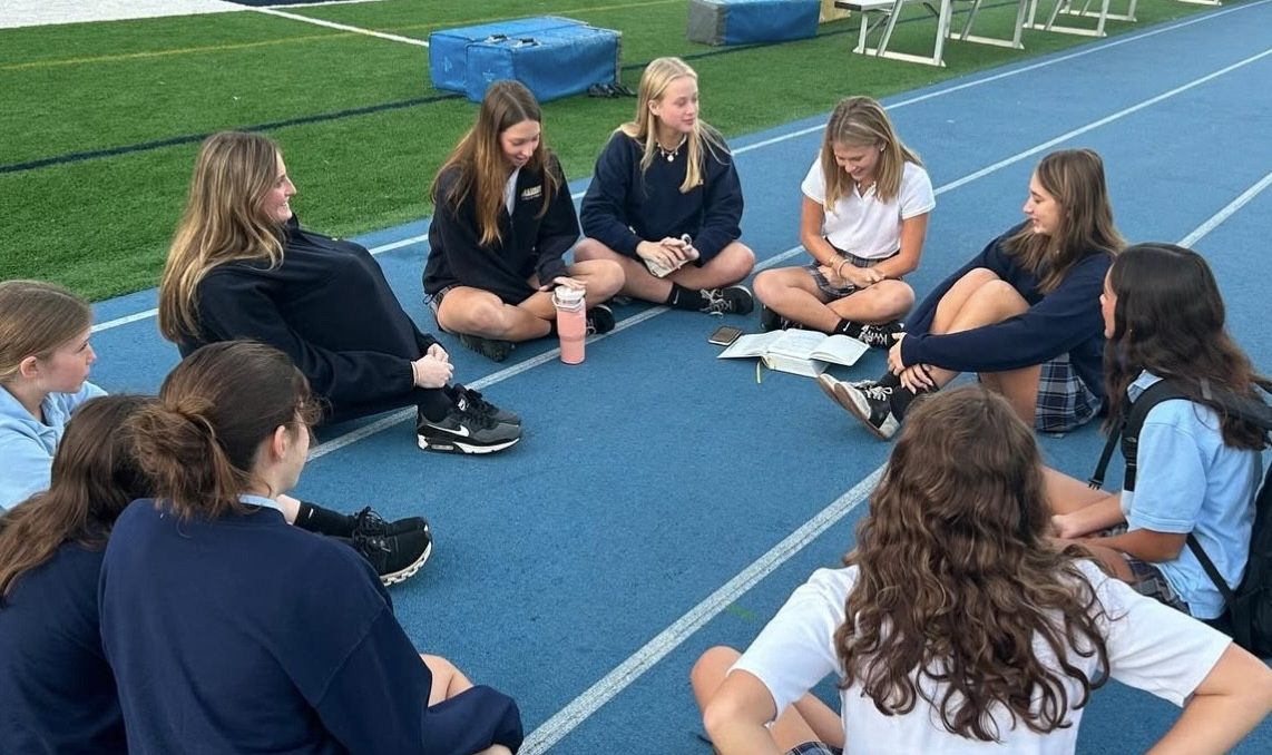 Girls Bible Study sets up shop on the track during one of their Friday morning meet-ups. (Photo Contributed)