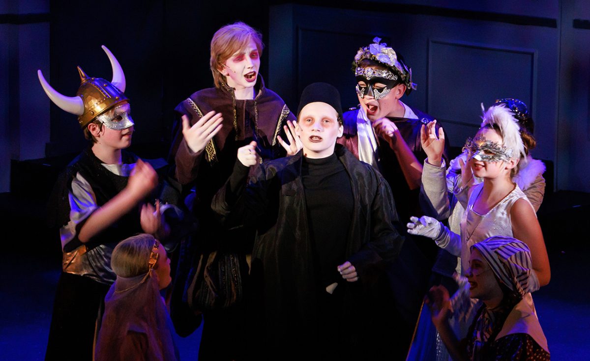 Members of the foundations cast portray the difficult lives of the Addams, a family whose lifestyle challenges the conventional ideas of what it means to be "normal." (Photographer: Brian Collier) 