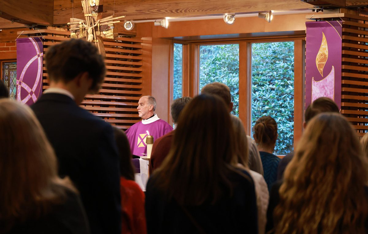 Fr. Kevin Duggan celebrates Mass in the school chapel. (Photographer: Brian Collier)