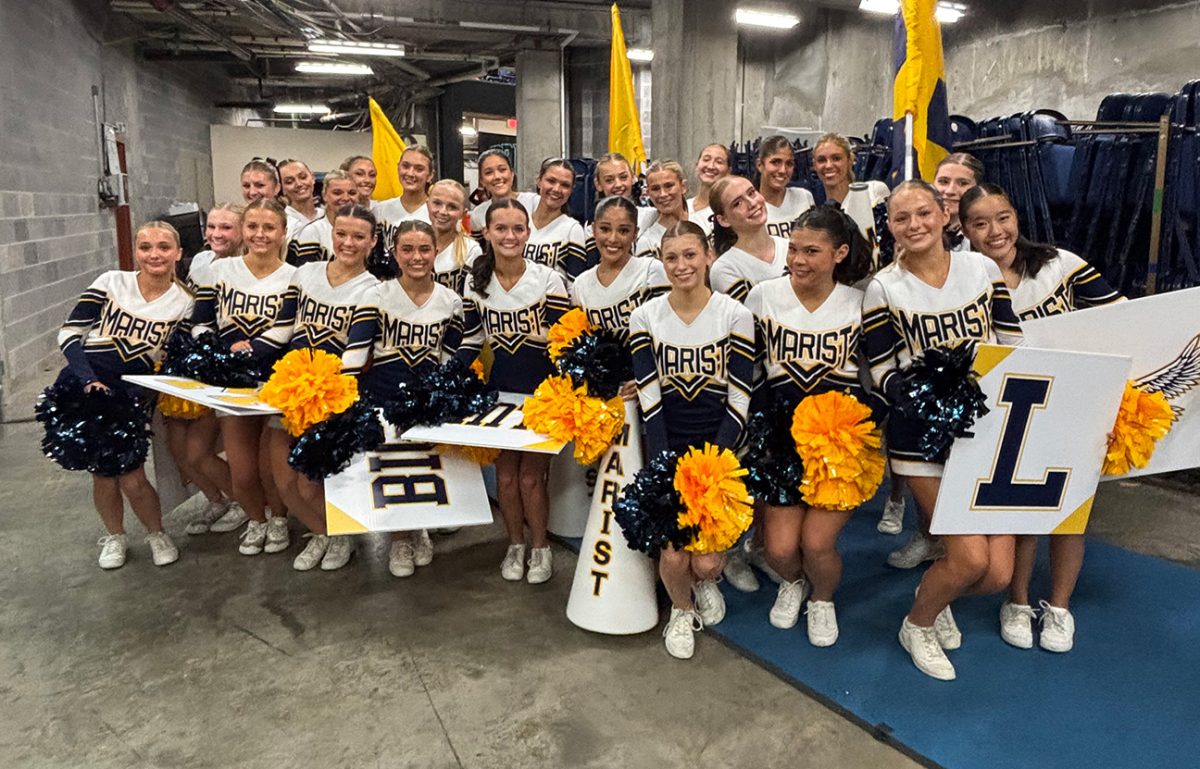 The competition squad calm their nerves before the upcoming qualifying round of the GHSA Game Day State Championship. (Elizabeth Dete)