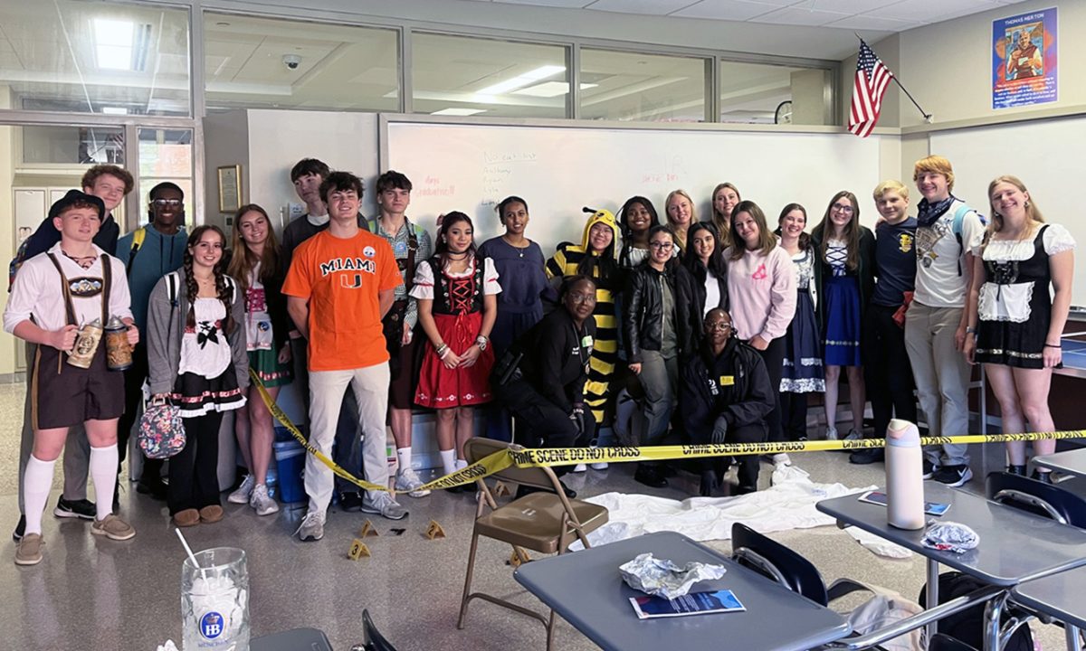 Members of the Law Society gather for a pictures after participating in the crime scene activity. (Ella Weber)