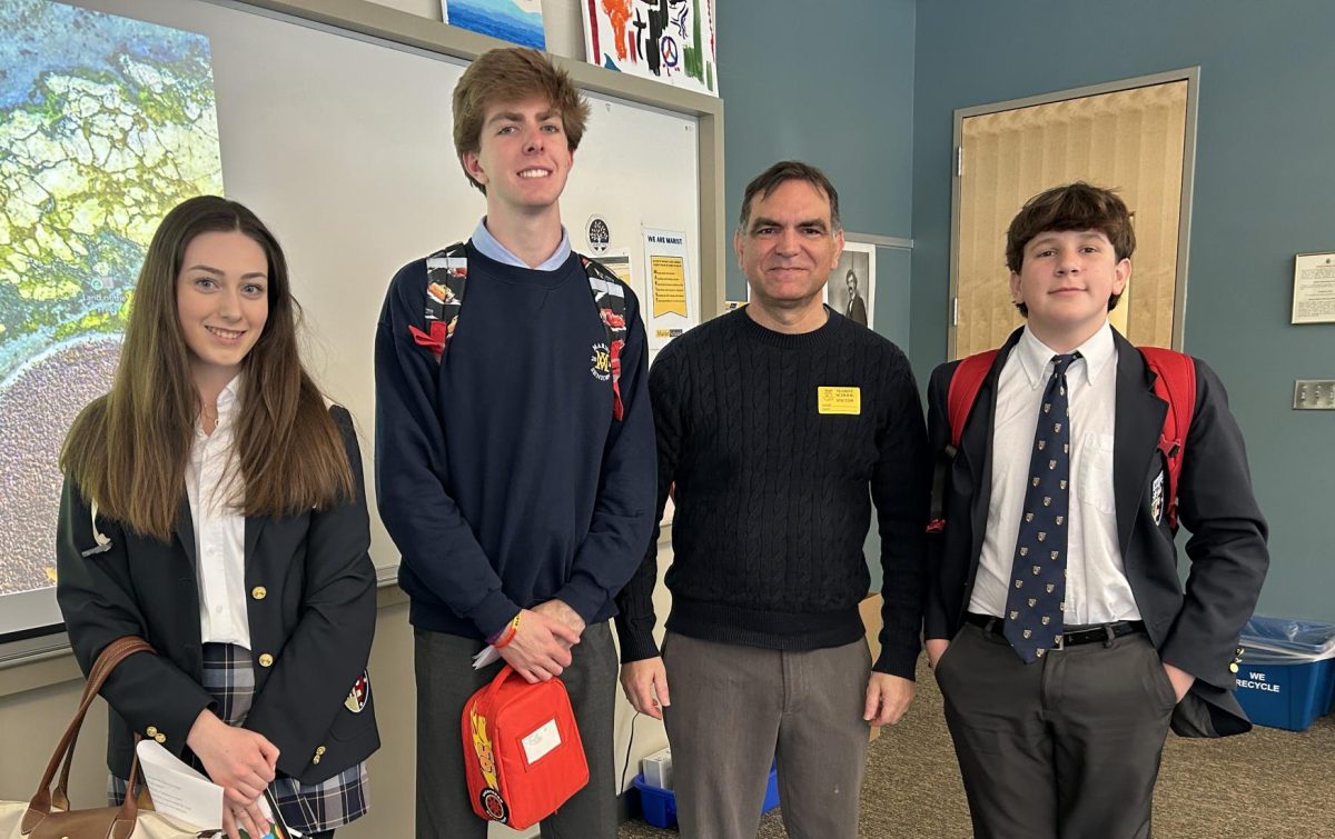 Bloomberg News Reporter Mike Sasso meets with members of the Media Literacy class to share his knowledge and experience about the changing media landscape. (O'Connor)