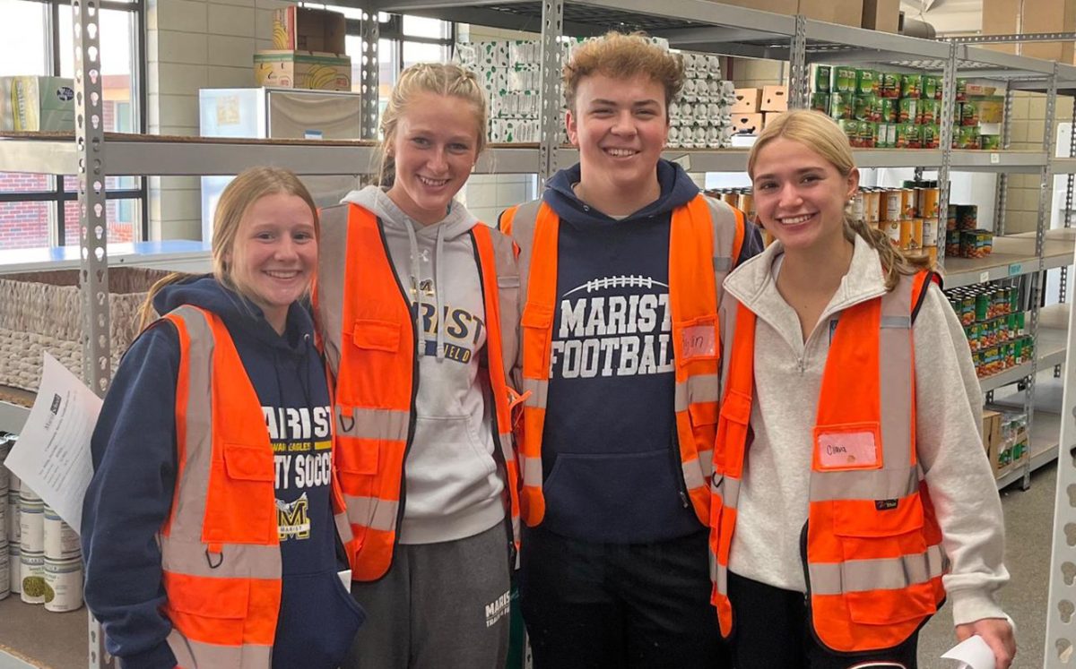 Several Marist students meet up at Suthers Food Pantry to spend the morning helping people in need. (Ryan Akin)