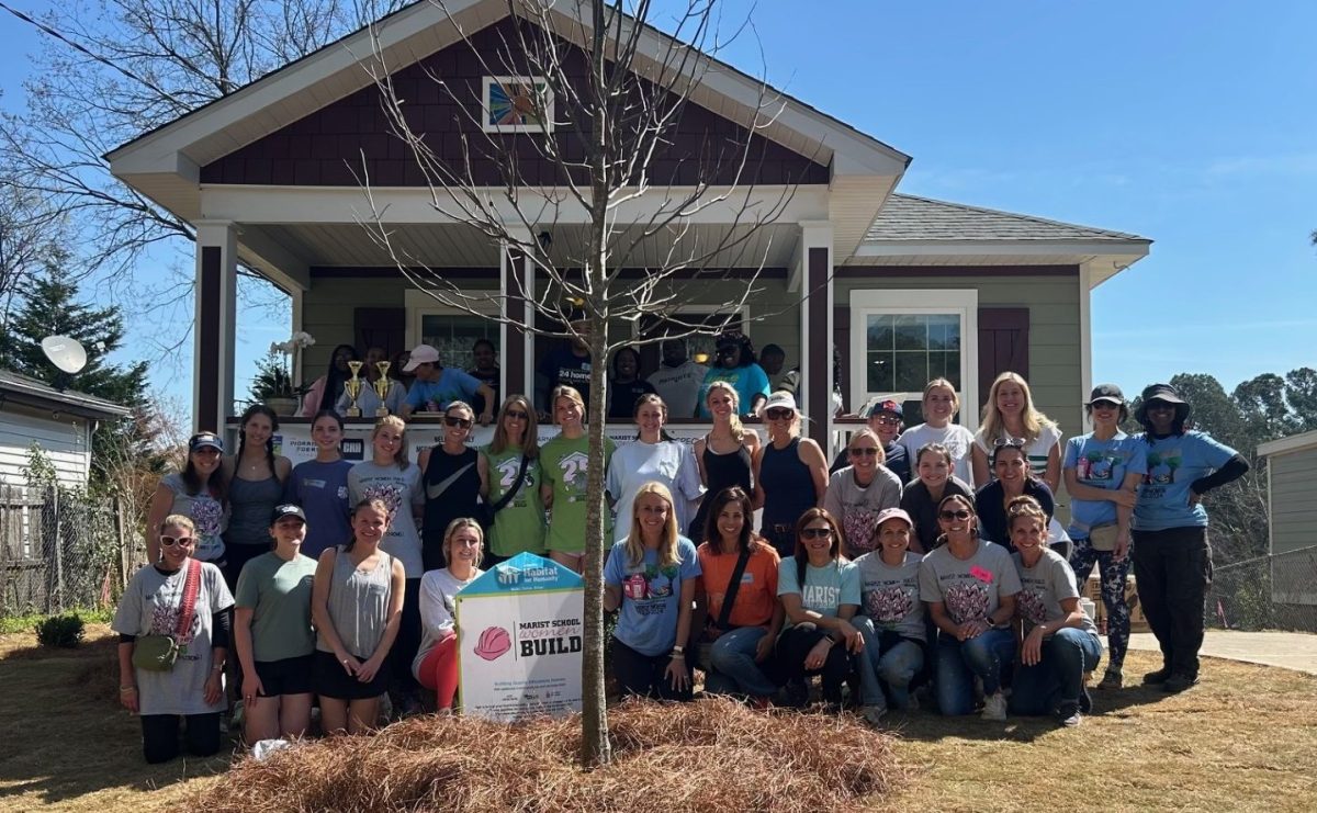 Volunteers for the 2026 Women's Build pose for a picture. Empowering women through homeownership is what the mission was all about. (Contributed)